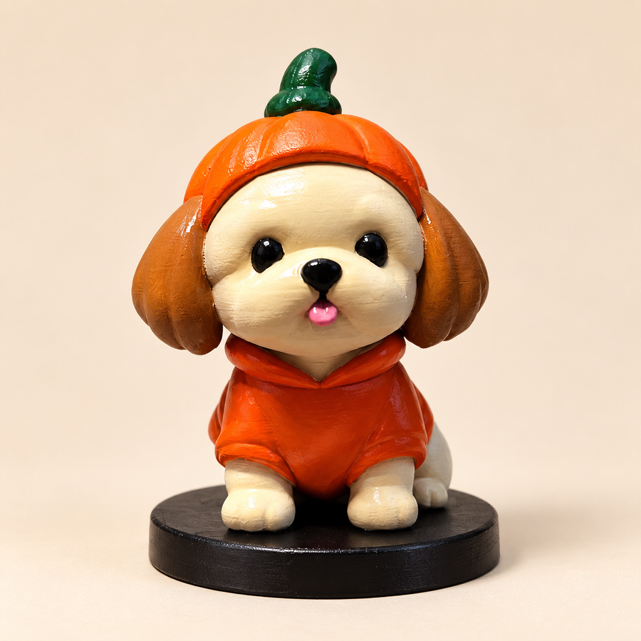 Hand-painted corgi figurine on a black base