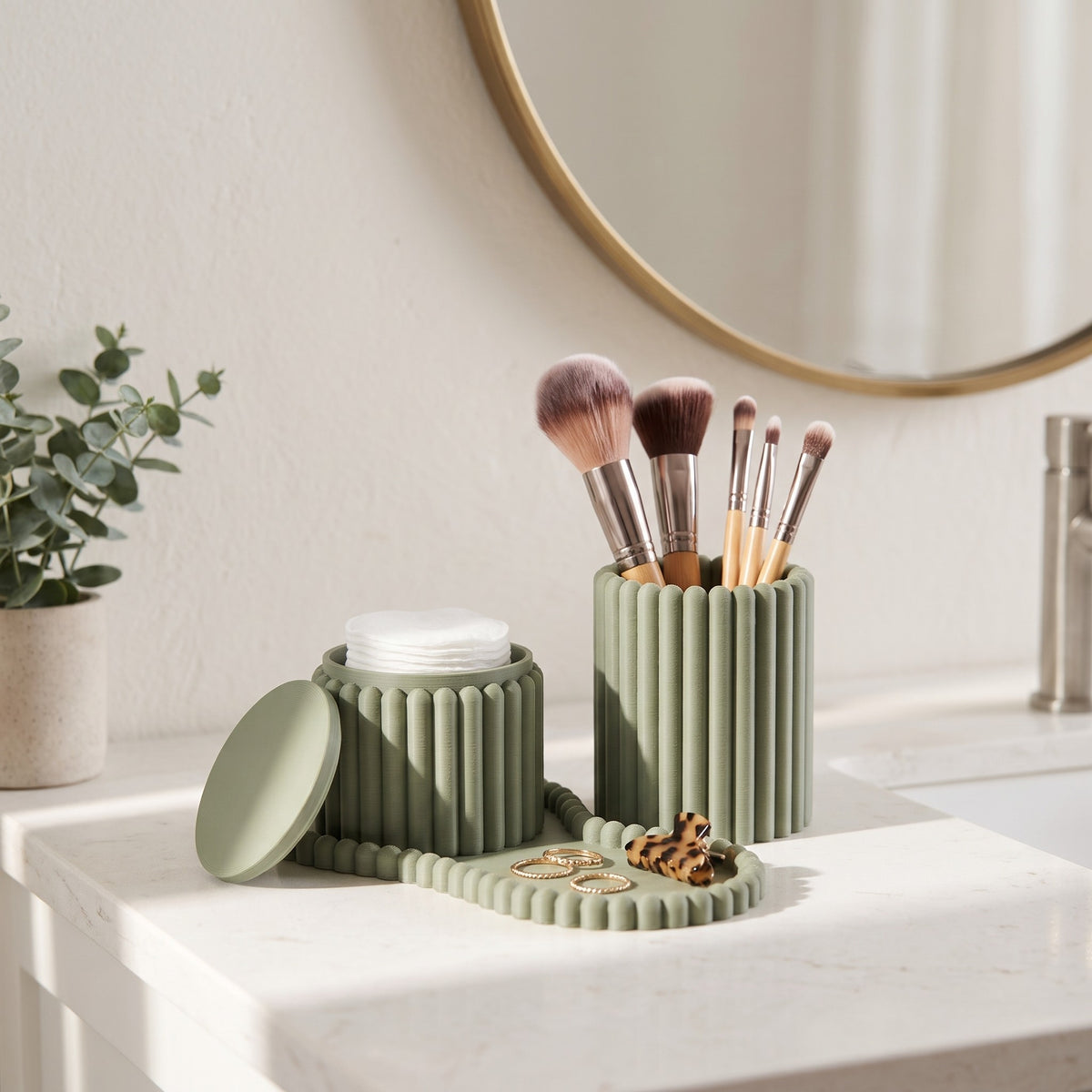 Ribblu organizer set on a bathroom vanity holding brushes and rings